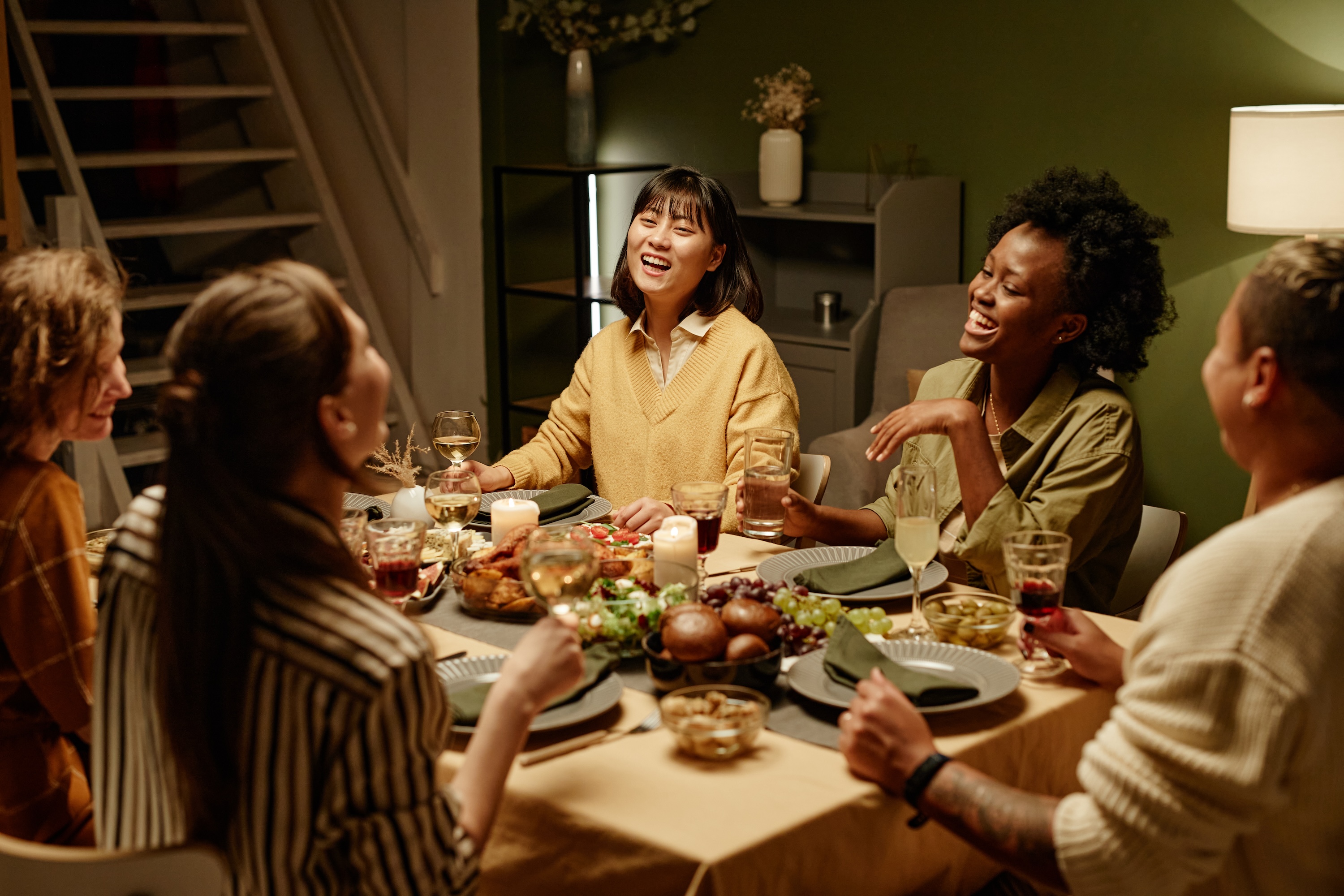 Friends and family enjoying thanksgiving meal